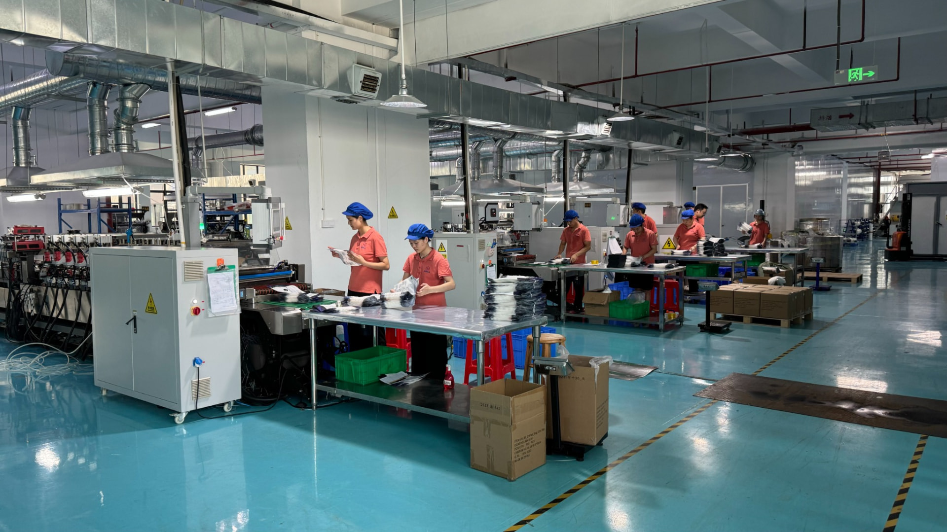 Factory floor — bag making and packing, Dongguan.